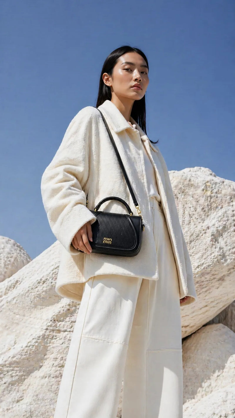 Black Ribbed Mini Handbag with Gold-Tone Hardware | Sufaab